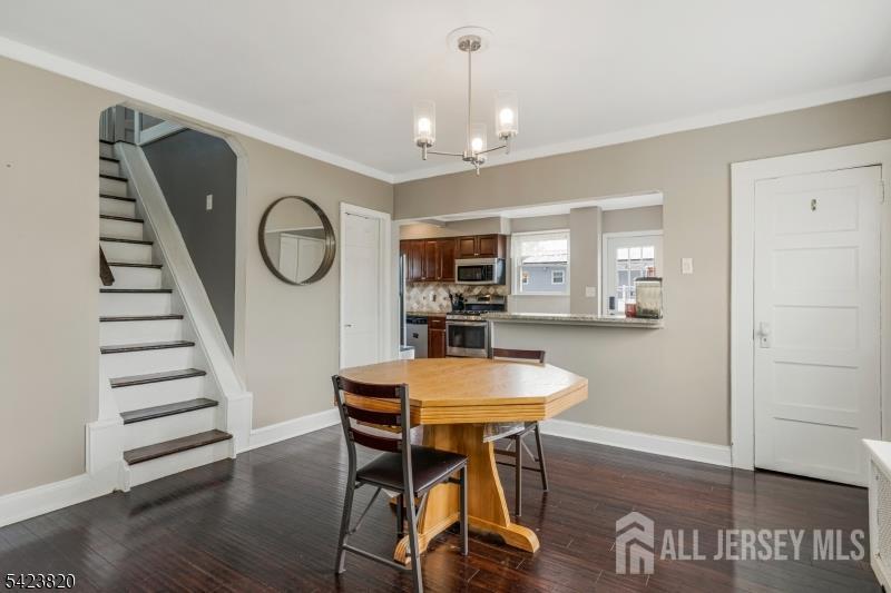110 Parker Street Middlesex, NJ 08846 - Photo 4 of 25 a view of a dining room with furniture and wooden floor