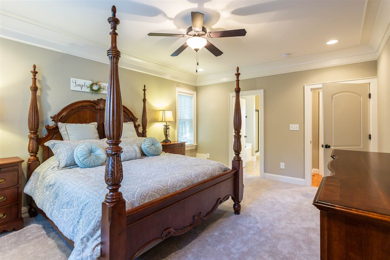12 Vista Ridge Drive Willow Spring, NC 27592 - Photo 16 of 30 You will rest well in this elegant first floor master bedroom which boasts heavy trim, recessed lighting, 2" blinds, and new carpet. A ceiling fan with light kit is provided for your convenience and comfort. Master Bedroom