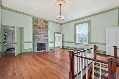 a view of livingroom with hardwood floor and window