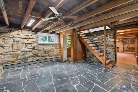 a view of an empty room with a balcony