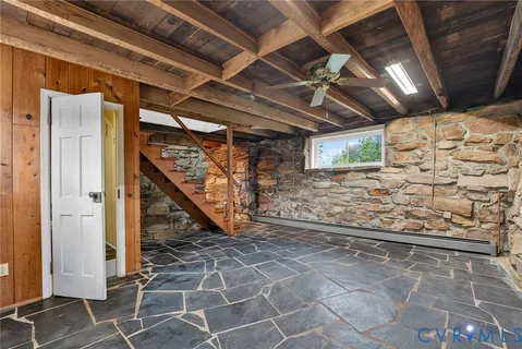 a kitchen with stove and cabinets