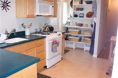 104 Clayton Street San Rafael, CA 94901 - Photo 5 of 5 a kitchen with stainless steel appliances granite countertop a stove and a refrigerator