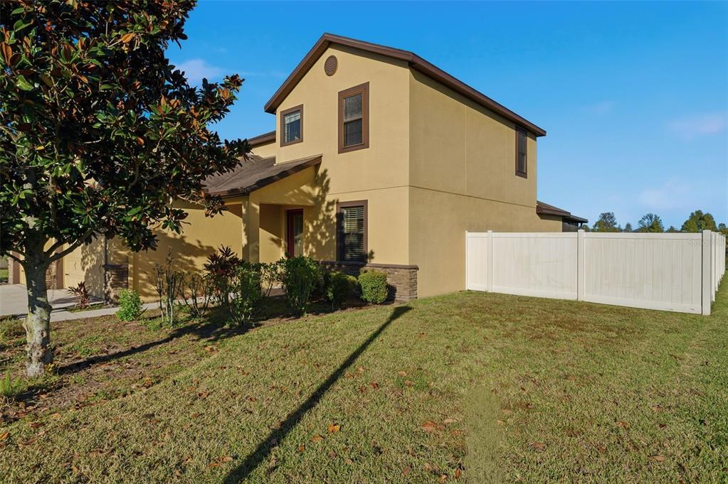 2318 Sebago Drive Lakeland, FL 33805 - Photo 4 of 54 a view of a house with a yard