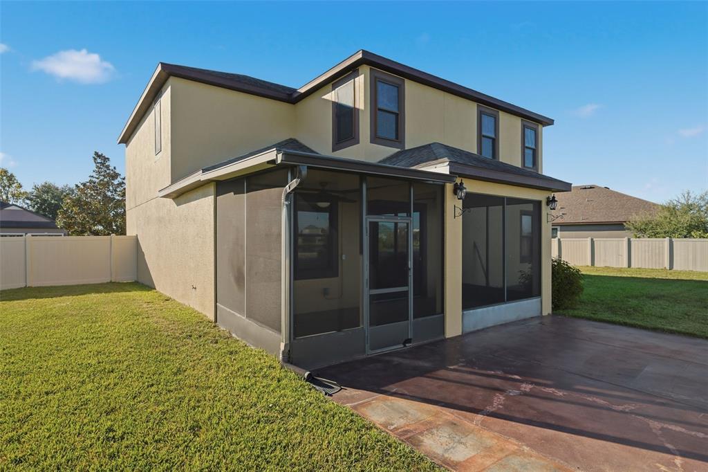 2318 Sebago Drive Lakeland, FL 33805 - Photo 47 of 54 a front view of a house with garden
