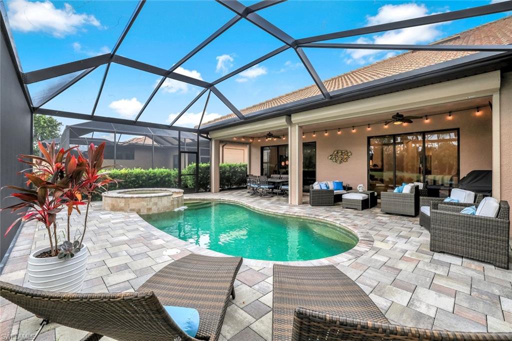 7523 Moorgate Point Way Naples, FL 34113 - Photo 8 of 32 Or lounge poolside and just enjoy the SWFL lifestyle!