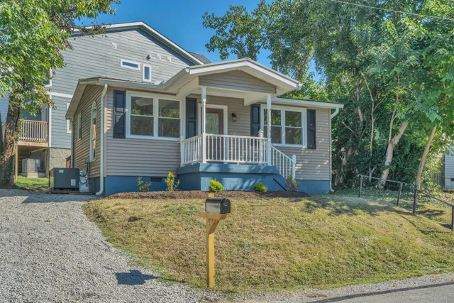 front view of a house with a yard