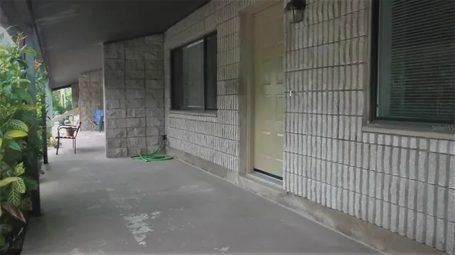 a view of a house with a street