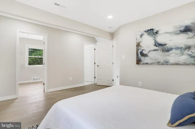 a bathroom with a bathtub and a sink