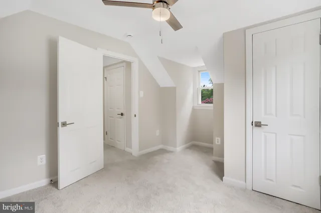a bathroom with a shower and a toilet