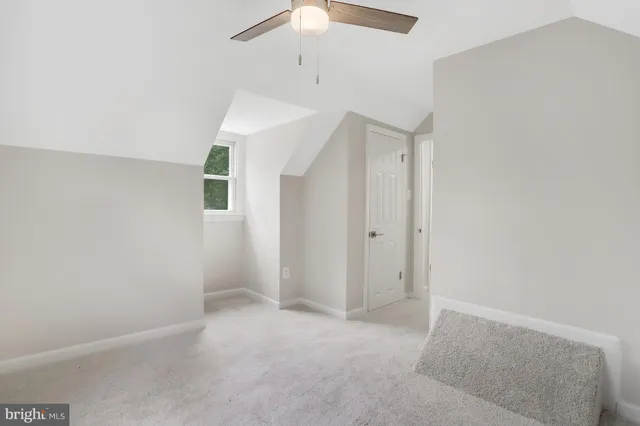 a view of a two chairs on the roof deck