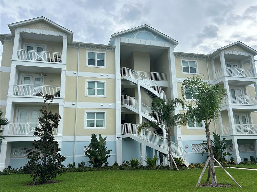 3426 79th Street Circle West, Unit 203 Bradenton, FL 34209 - Photo 2 of 30 a front view of house with yard and green space