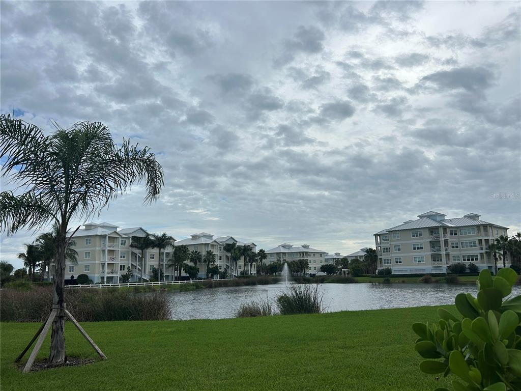 3426 79th Street Circle West, Unit 203 Bradenton, FL 34209 - Photo 27 of 30 a view of a lake with houses