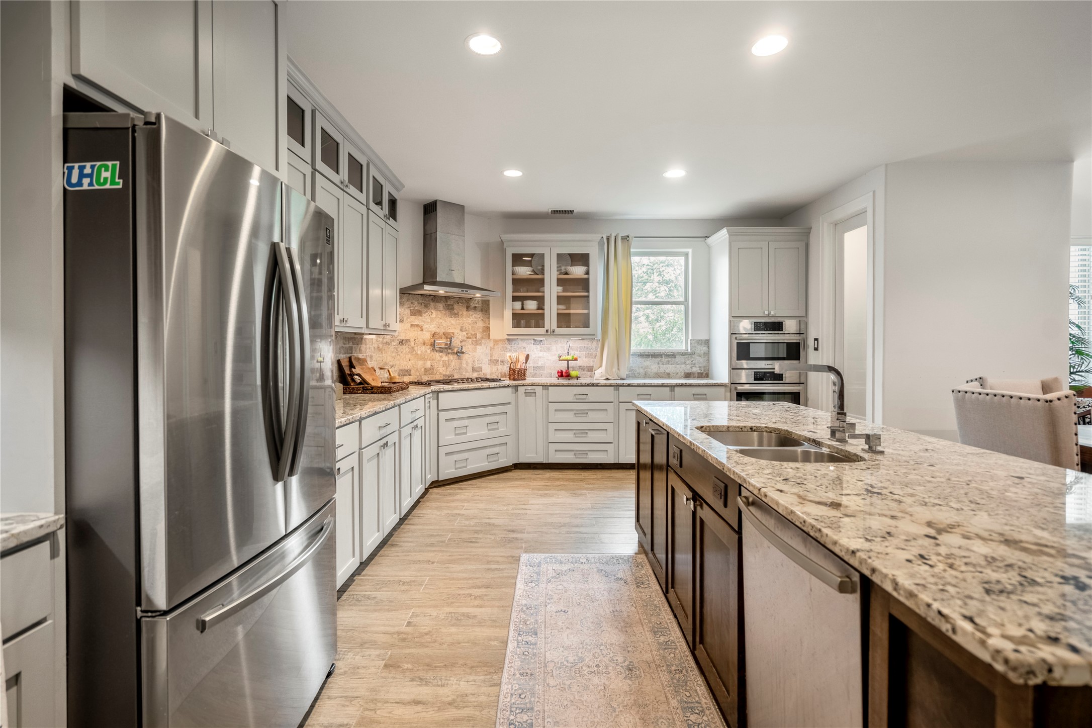 3202 Ozark Street Houston, TX 77021 - Photo 15 of 31 Gourmet kitchens includes a large gas cooktop, pot filler, and double ovens.