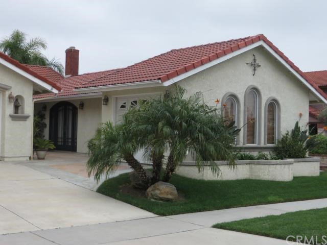 1444 Ripchak Road Corona, CA 92879 - Photo 1 of 1 Front entry to home with 3rd car garage & built-in workshop to the right.