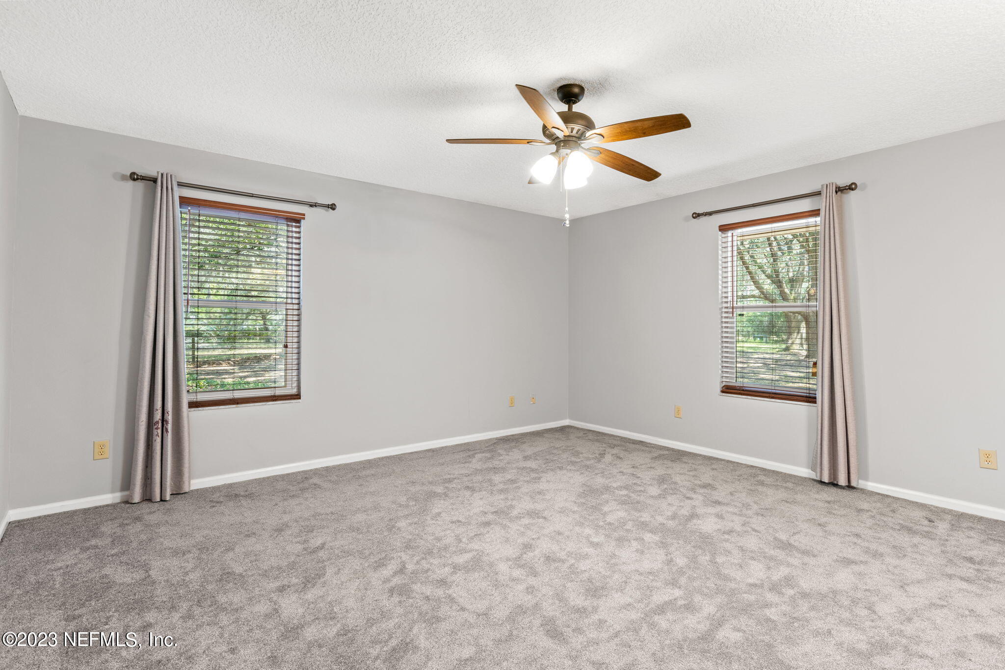 3233 Fritz Road Jacksonville, FL 32226 - Photo 23 of 43 a view of an empty room with a window