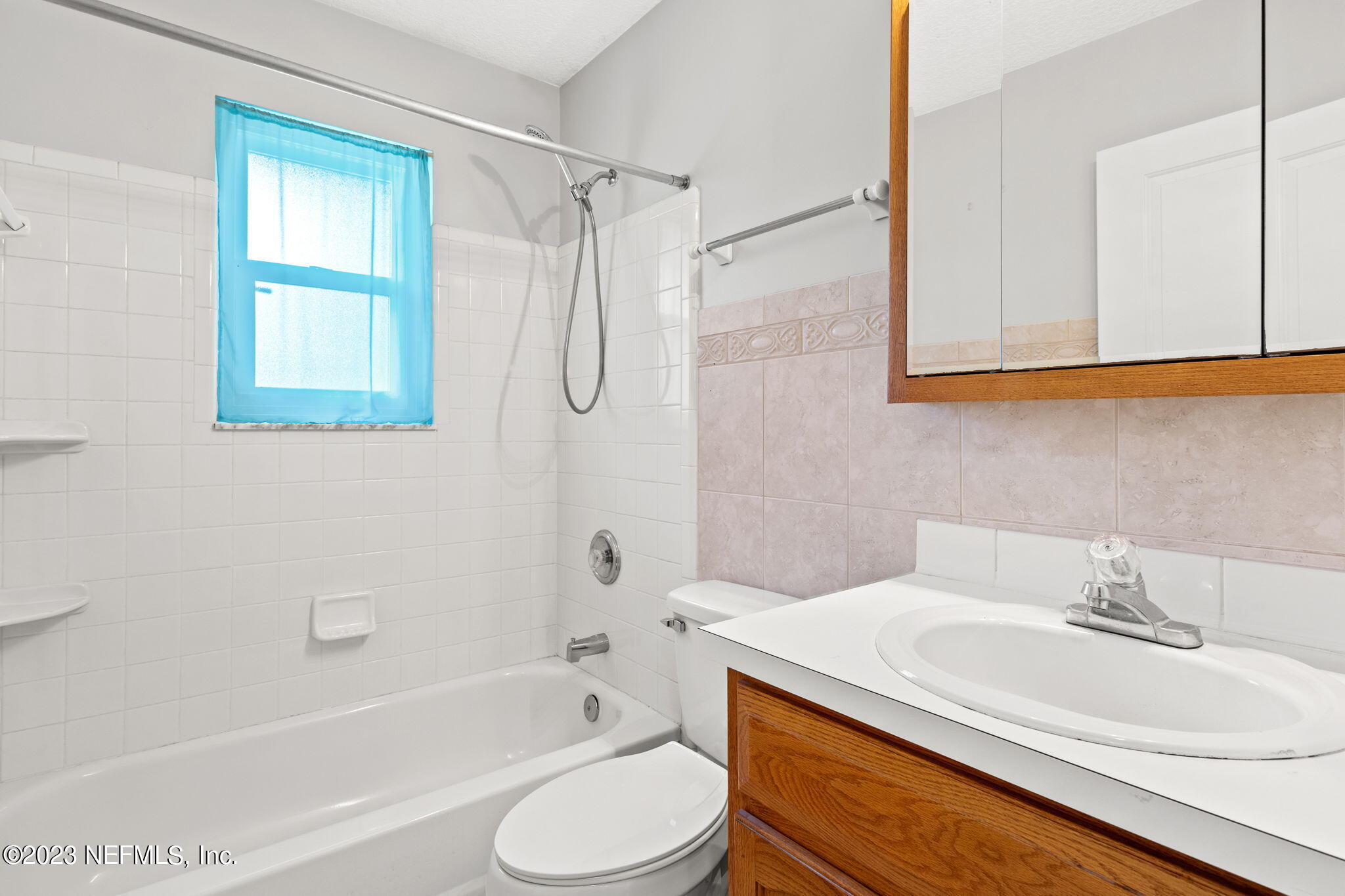 3233 Fritz Road Jacksonville, FL 32226 - Photo 29 of 43 a bathroom with a sink toilet and shower