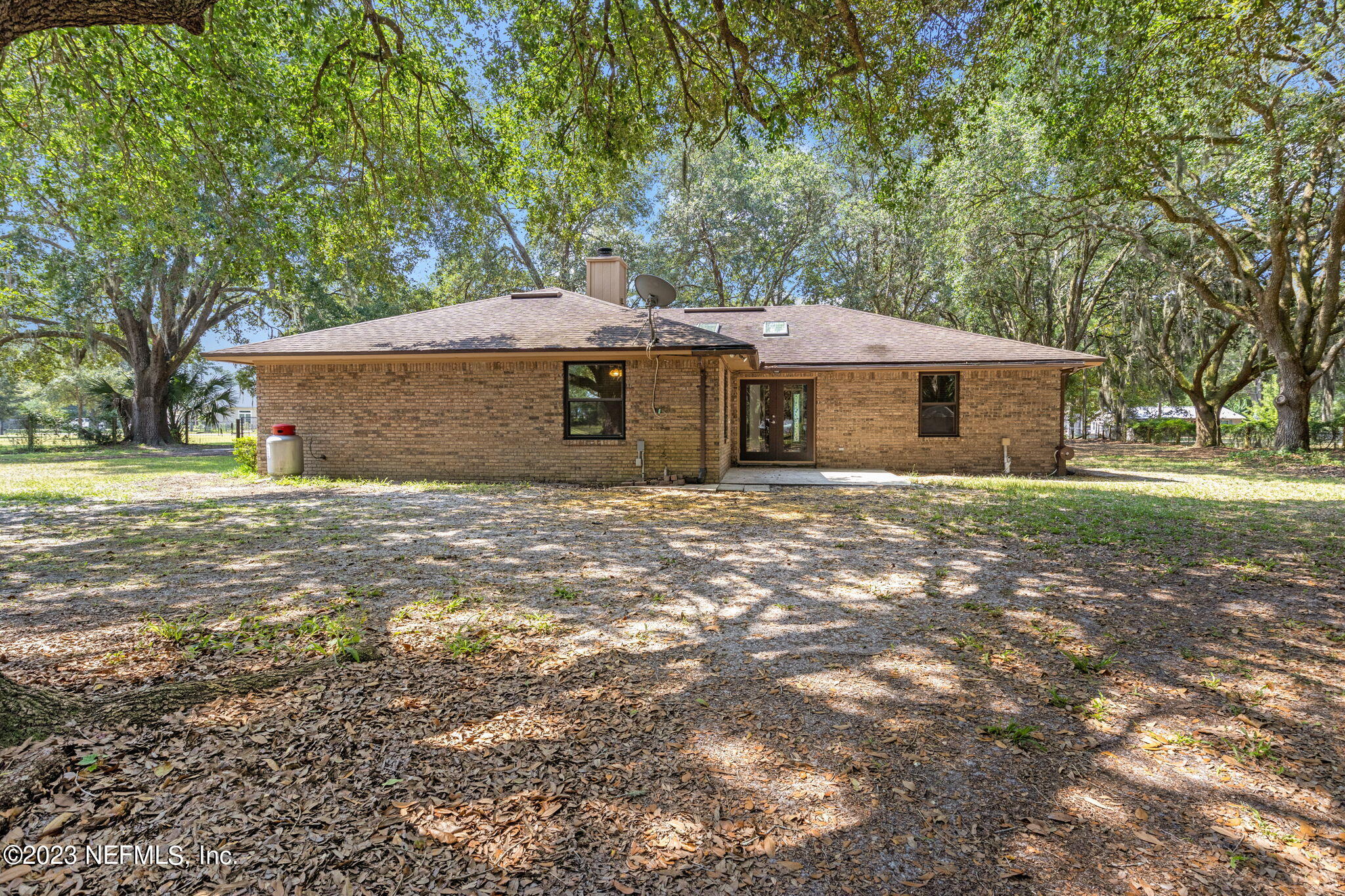 3233 Fritz Road Jacksonville, FL 32226 - Photo 34 of 43 a view of a house with a yard