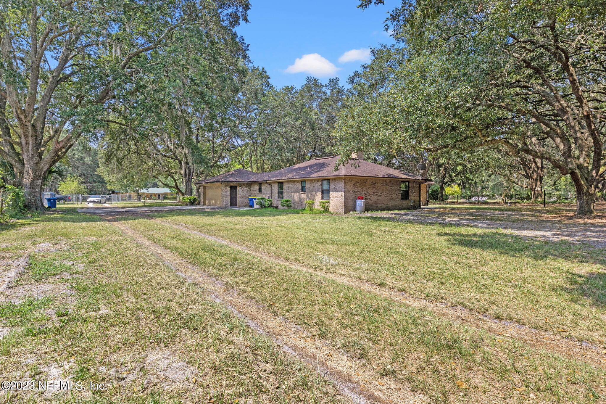 3233 Fritz Road Jacksonville, FL 32226 - Photo 36 of 43 a house view with swimming pool in front of it