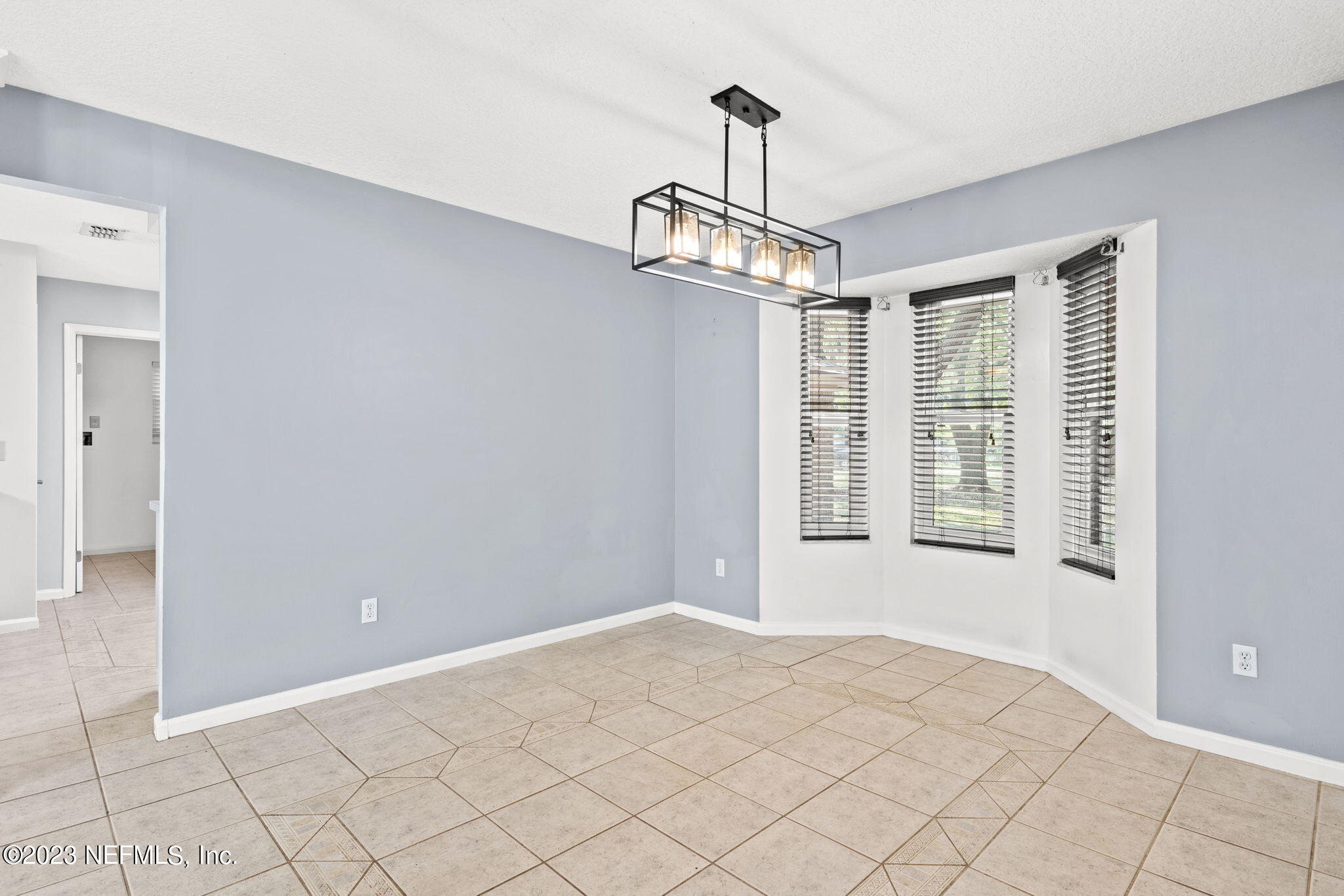 3233 Fritz Road Jacksonville, FL 32226 - Photo 8 of 43 a view of an empty room with window