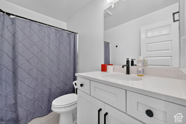 4751 Heartwood Road Mapleton, UT 84664 - Photo 23 of 33 White shaker-style vanity with a quartz countertop and integrated sink