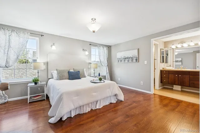 a bedroom with a bed and a view of bathroom