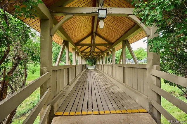 a view of balcony with wooden floor