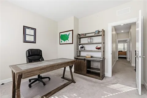 a view of workspace with a couch