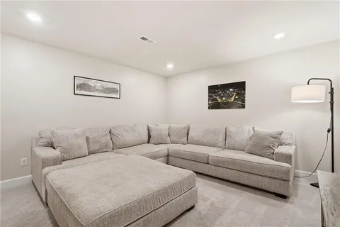 a living room with furniture and a couch