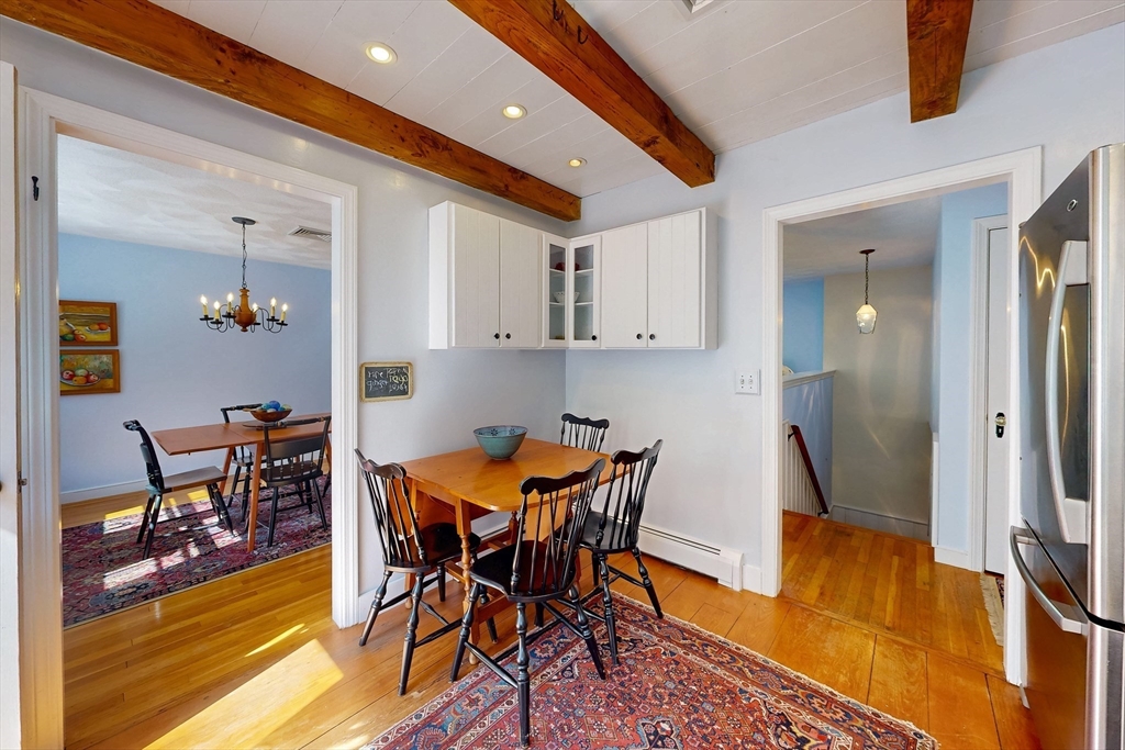 3 Spring Valley Road Medfield, MA 02052 - Photo 7 of 21 a view of a dining room with furniture and wooden floor