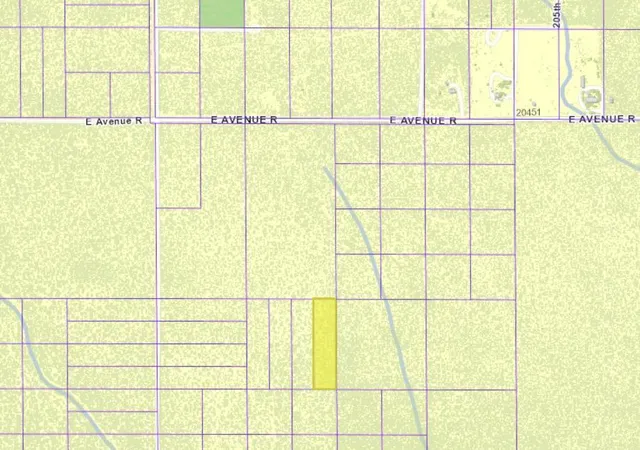 a bathroom with a black gate