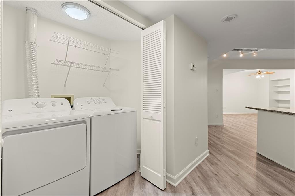 199 14th Street Northeast, Unit 201 Atlanta, GA 30309 - Photo 12 of 42 a utility room with dryer and washer