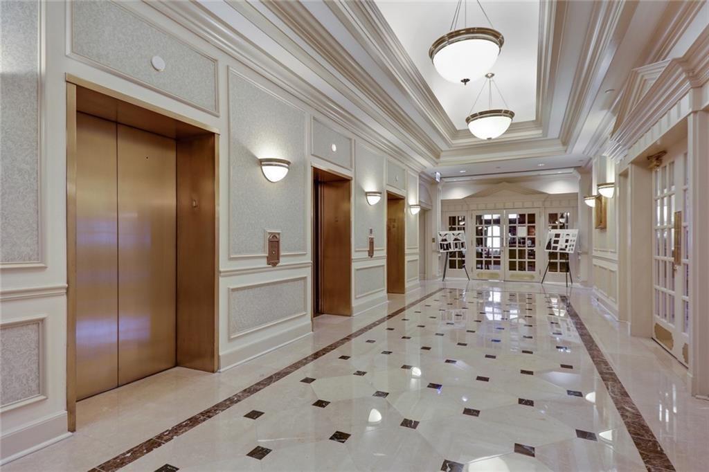199 14th Street Northeast, Unit 201 Atlanta, GA 30309 - Photo 21 of 42 a view of a hallway with dining area