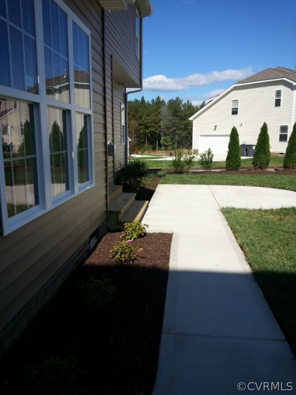 Great patio and look how big this yard is!