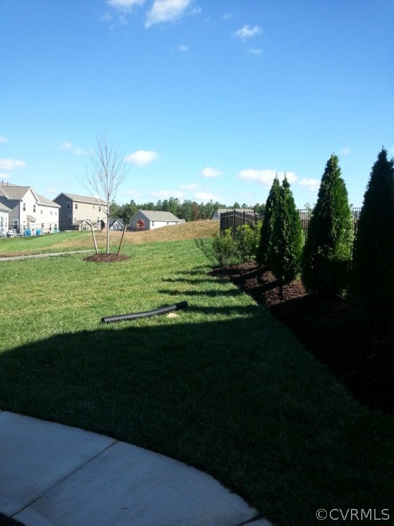 Your new yard backs up to huge common ground area.