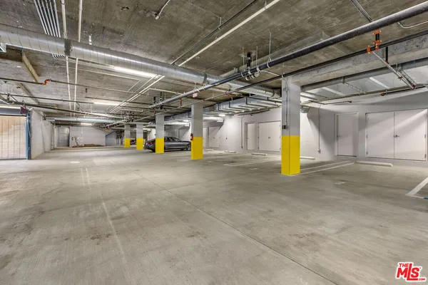 a view of a garage with trees