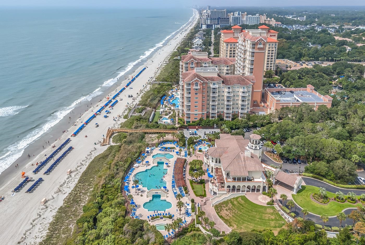 5830 Cremona Drive Myrtle Beach, SC 29577 - Photo 37 of 39 Drone / aerial view of a pool and unending shoreline