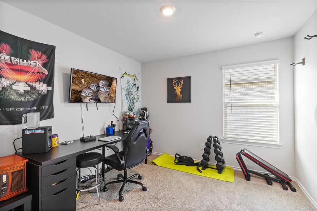 613 Whitecomb Lane Justin, TX 76247 - Photo 22 of 29 a room with furniture and air hockey table