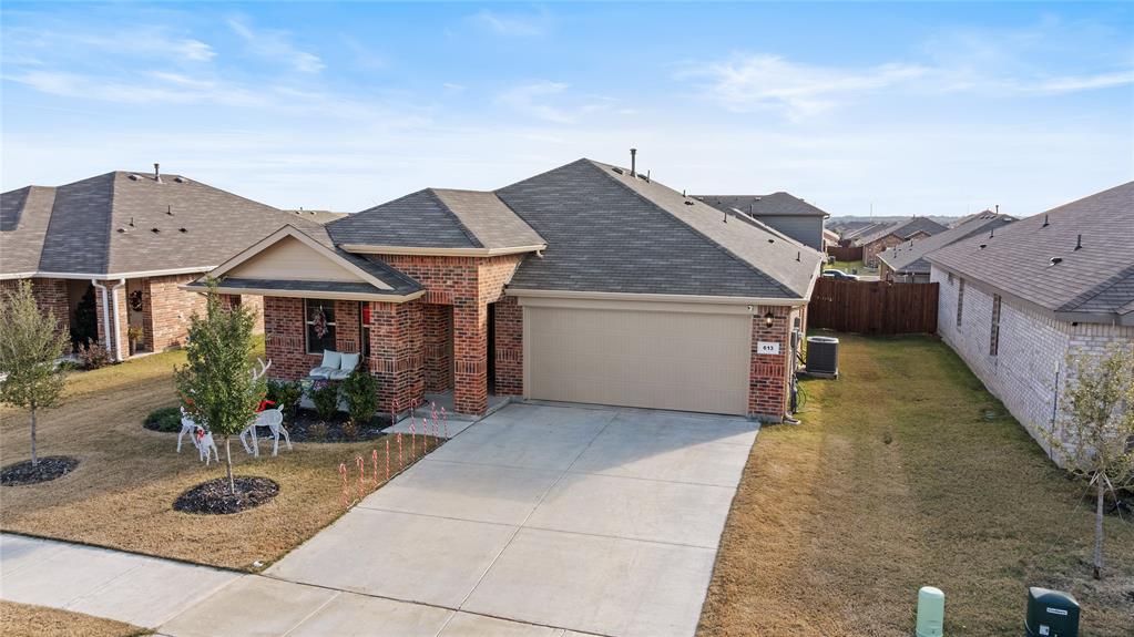 613 Whitecomb Lane Justin, TX 76247 - Photo 24 of 29 a house view with a garden space