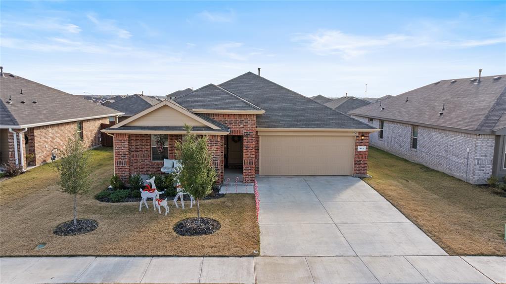613 Whitecomb Lane Justin, TX 76247 - Photo 25 of 29 a house view with a garden space