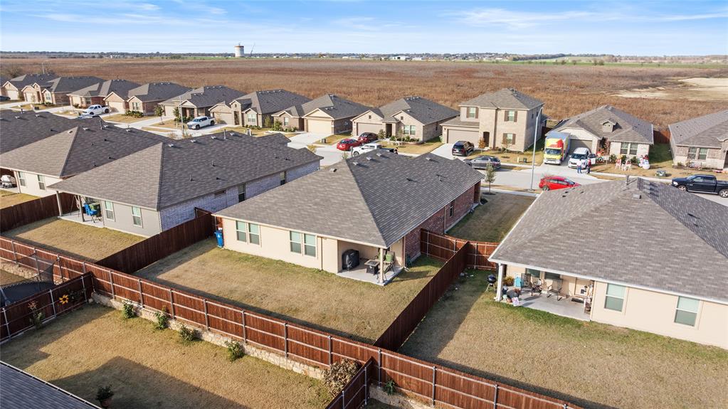 613 Whitecomb Lane Justin, TX 76247 - Photo 26 of 29 a view of houses with outdoor space and lake view
