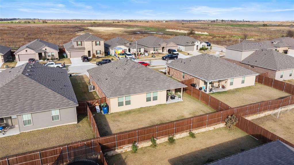 613 Whitecomb Lane Justin, TX 76247 - Photo 27 of 29 a view of a city with tall buildings