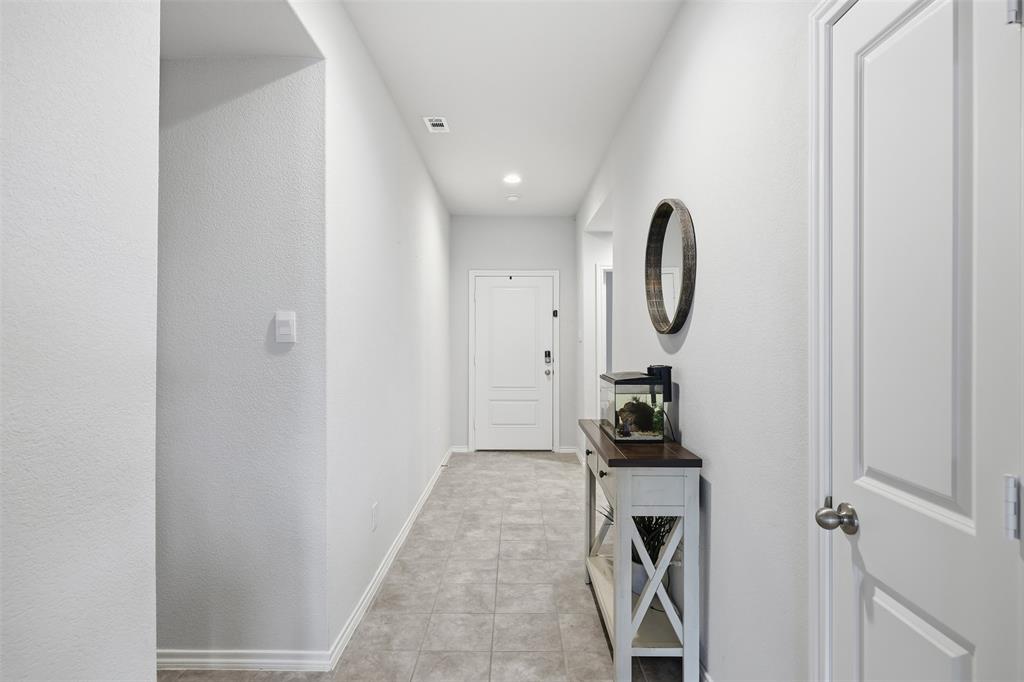 613 Whitecomb Lane Justin, TX 76247 - Photo 3 of 39 a view of a hallway with entryway
