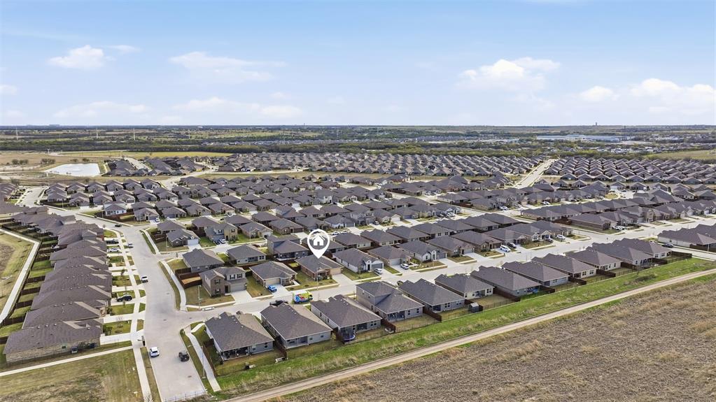 613 Whitecomb Lane Justin, TX 76247 - Photo 38 of 39 an aerial view of residential building and lake