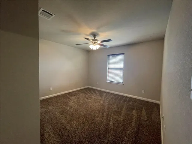 a view of a room with an empty space