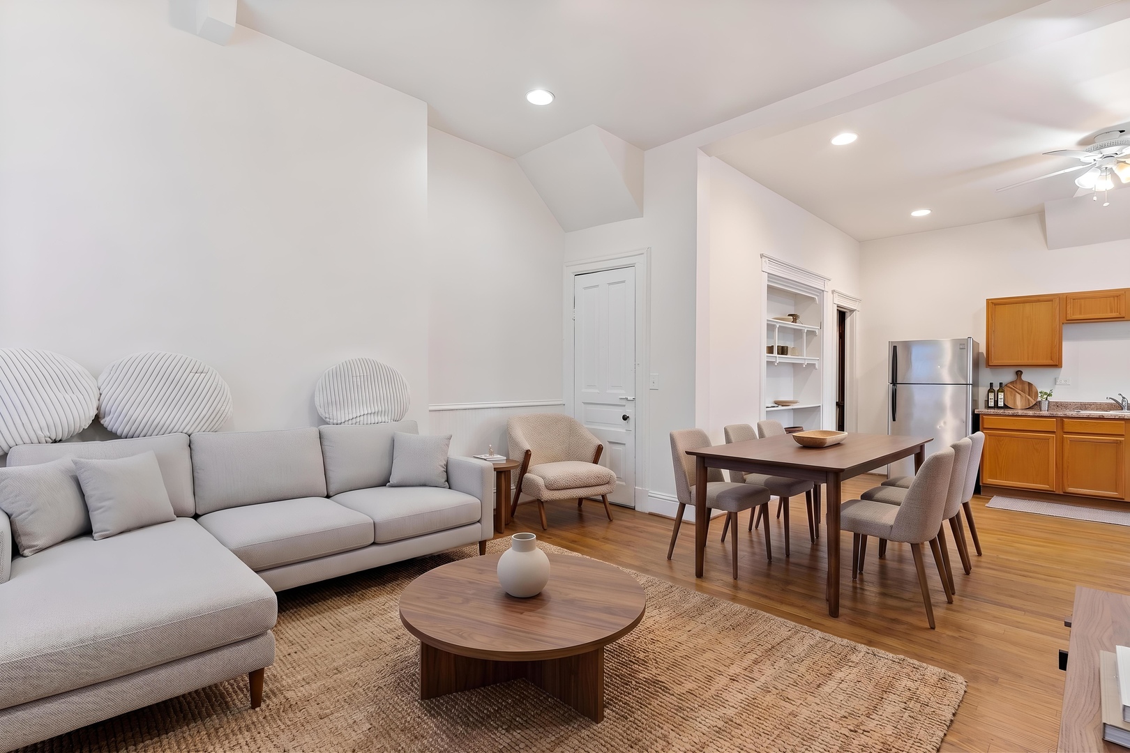 1132 East 44th Street Chicago, IL 60653 - Photo 4 of 23 a living room with furniture a rug and a table