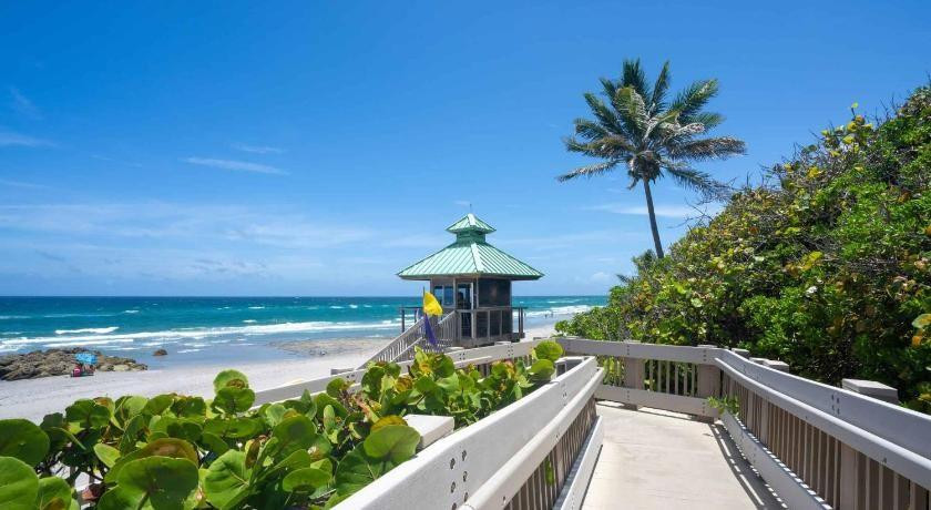 5340 Northwest 2nd Avenue, Unit PH26 Boca Raton, FL 33487 - Photo 14 of 53 a view of a ocean with a garden