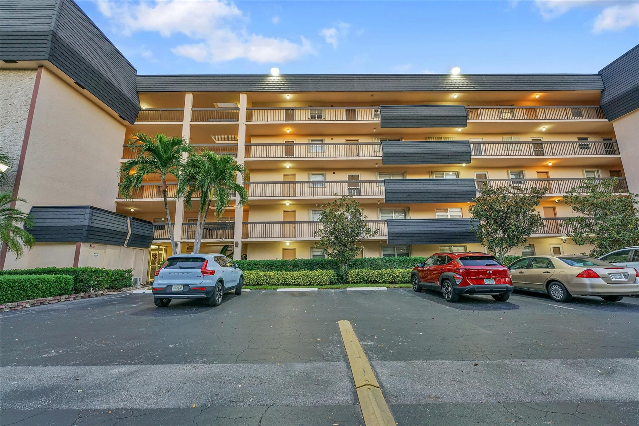 5340 Northwest 2nd Avenue, Unit PH26 Boca Raton, FL 33487 - Photo 15 of 53 a car parked in front of a building