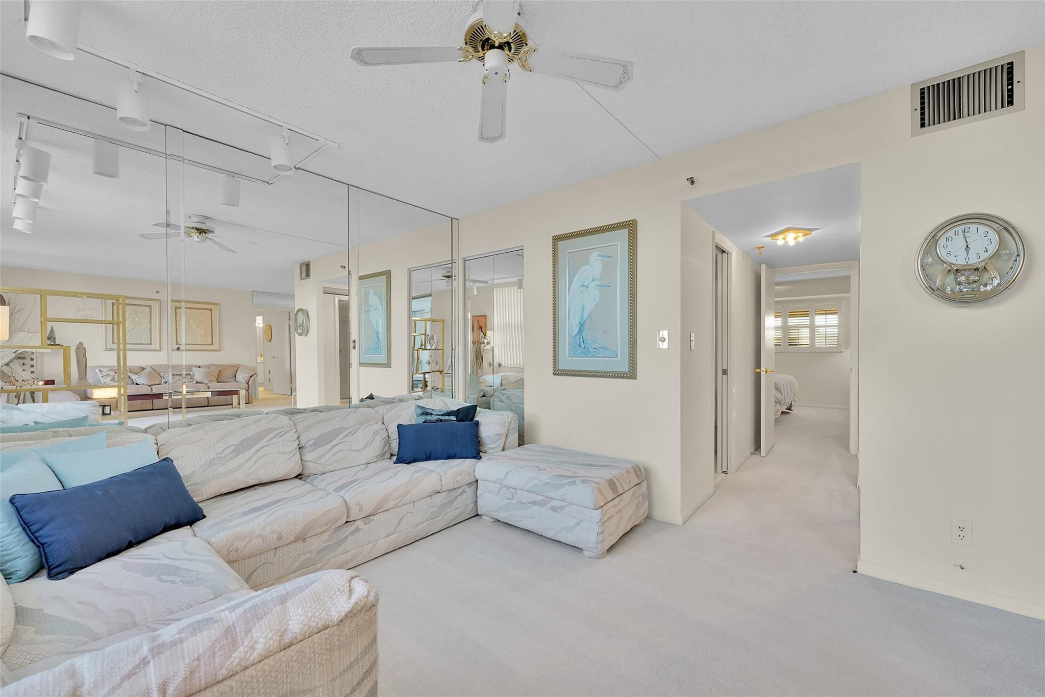 5340 Northwest 2nd Avenue, Unit PH26 Boca Raton, FL 33487 - Photo 21 of 53 a living room with furniture and a large window