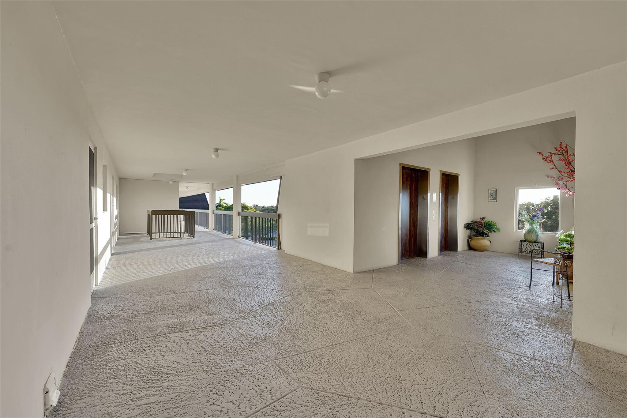 5340 Northwest 2nd Avenue, Unit PH26 Boca Raton, FL 33487 - Photo 36 of 53 a view of empty room with wooden floor