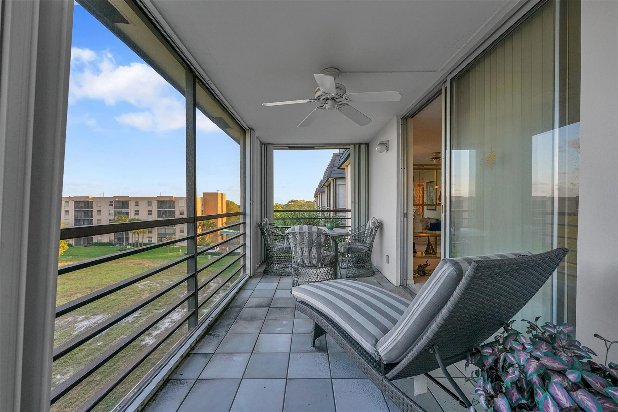 5340 Northwest 2nd Avenue, Unit PH26 Boca Raton, FL 33487 - Photo 41 of 53 a view of two chairs in the balcony
